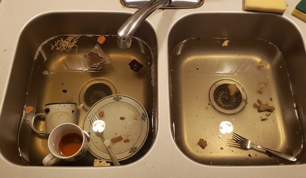 pia da cozinha entupida
